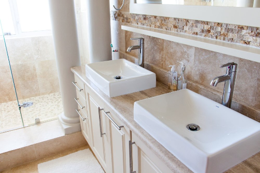 sinks Double sink vanity in a home bathroom